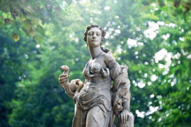 Sandstone statues in the Saxon Garden, Warsaw, Poland. Made before 1745 by anonymous Warsaw sculptor under the direction of Johann Georg Plersch. Statues of Greek mythical muses. clipart