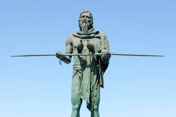 Statue of Anaterve, a Guanche chief or a mencey, part of the nine statues of pre-Hispanic kings situated in Plaza de la Patrona de Canarias, in Candelaria, Tenerife, Canary Islands, Spain