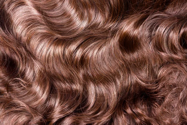 Brązowe Włosy Faliste Długie Kręcone Jasnobrązowe Włosy Zbliżyć Jako Tło — Zdjęcie stockowe