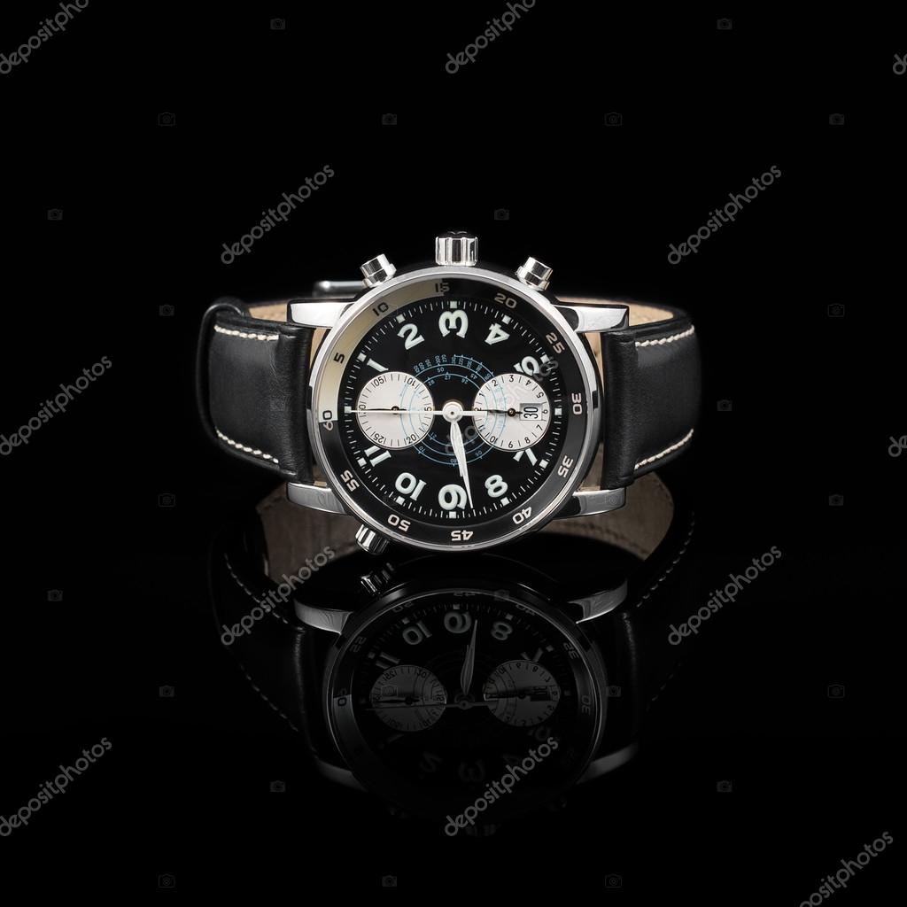 Relojes suizos sobre fondo negro fotograf a de stock