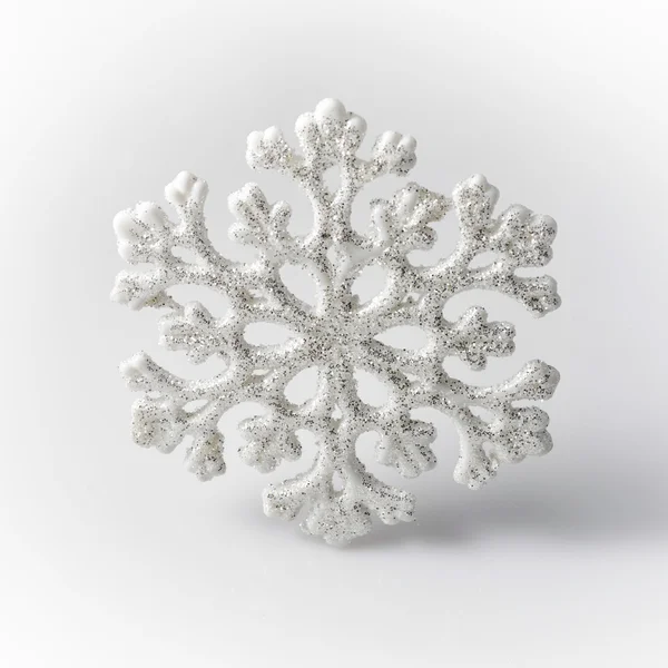 White Snowflake on a white background. Winter symbol — Stock Photo, Image