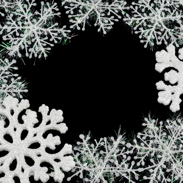 The frame of the snowflakes with space for your text on black background. New year theme. Winter symbol — Stock Photo, Image