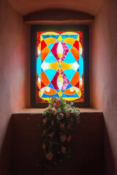 Stained glass old window in the castle. — Stock Photo, Image