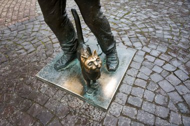 Monument of Happy Chimney Sweeper and his cat. The monument with real chimney sweeper Bertalon Tovt as prototype was unveiled on June 12, 2010 by Ukrainian sculptor Ivan Brovdi.