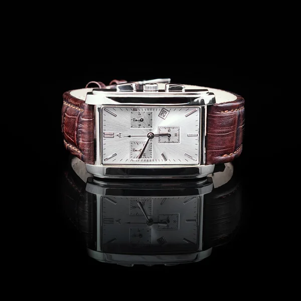 Swiss watches on black background. Product photography.