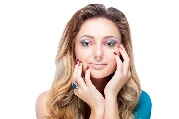 Beautiful blonde girl with bright makeup, long curled hair and massive jewelry isolated on white background. Fashion shot. — Stock Photo, Image