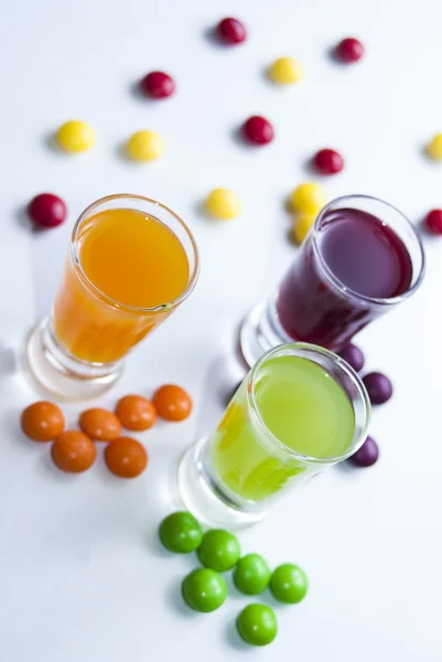 Vodka with colorful candy — Stock Photo, Image