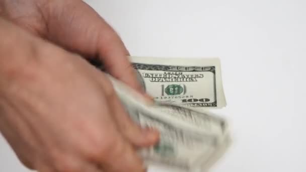 Close up view of man's hands count hundred dollar bills — Stock Video