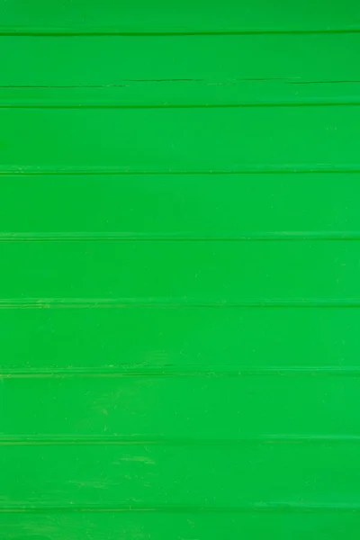 Gamla trä bakgrund i neongrön färg. — Stockfoto