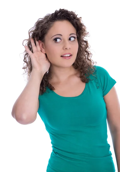 Isolated young funny woman in green listening for special sales Stock Photo