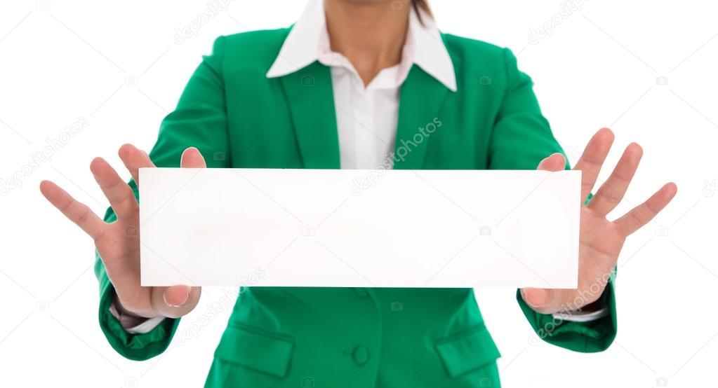 Isolated woman hands holding white sign wearing green blazer.