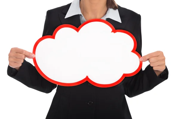 Isolated businesswoman holding a red sign in her hands. — Stock Photo, Image