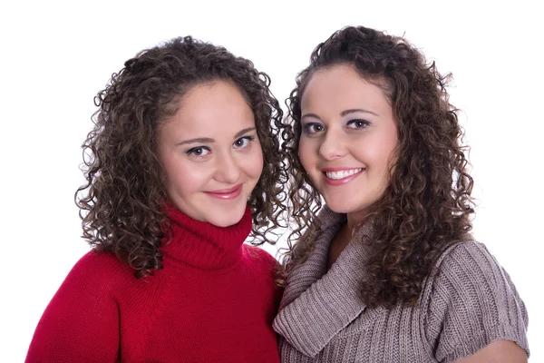 Happy girls: Portrait of real female twins wearing winter pullov — Stock Photo, Image