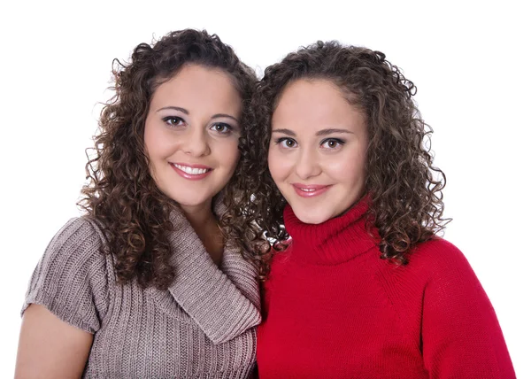 Happy girls: Portrait of real female twins wearing winter pullov — Stock Photo, Image