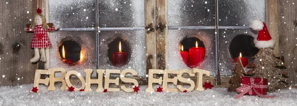 Festive Christmas window decoration with red candles. — Stock Photo, Image