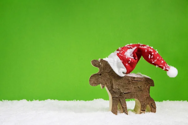 圣诞贺卡与绿色的红色和白色上校的驯鹿 — 图库照片