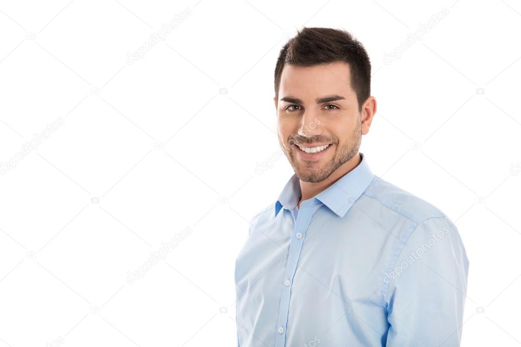 Portrait: Isolated handsome smiling business man over white.