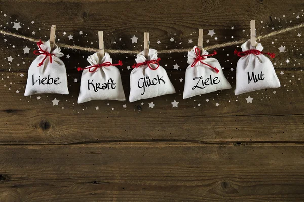 Biglietto di Natale tedesco o sfondo con testo: amore, potere, fortuna — Foto Stock