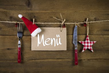 Bıçak ve çatal woode üzerinde olan restoranlar için Noel menü kartı
