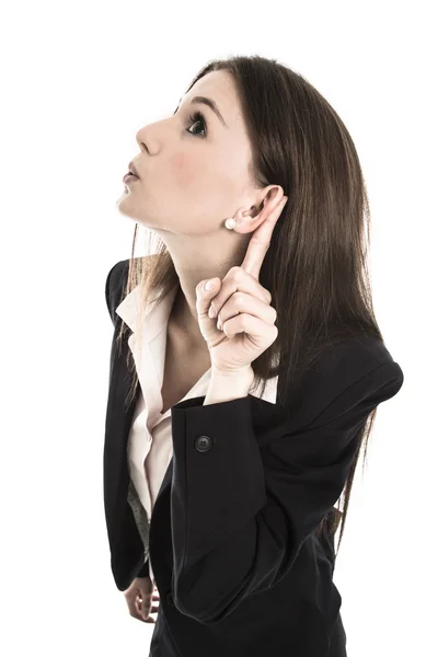 Nosy ung kvinna lyssna på dörren. Koncept för nyheter. — Stockfoto