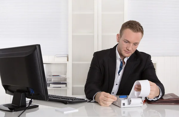 Occupation controller: young businessman looking frustrated at p — Stock Photo, Image