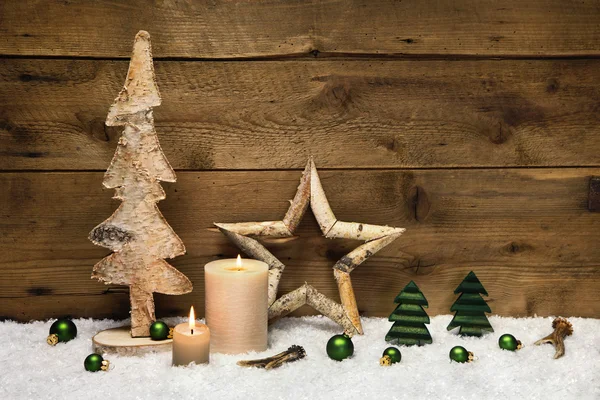 Rustic wooden christmas card with candles and handmade decoratio — Stock Photo, Image