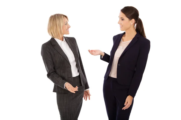 Duas empresárias isoladas conversando em conjunto: conceito de corpo la — Fotografia de Stock