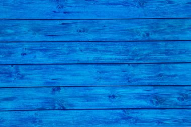 Blue wooden board for a background. clipart