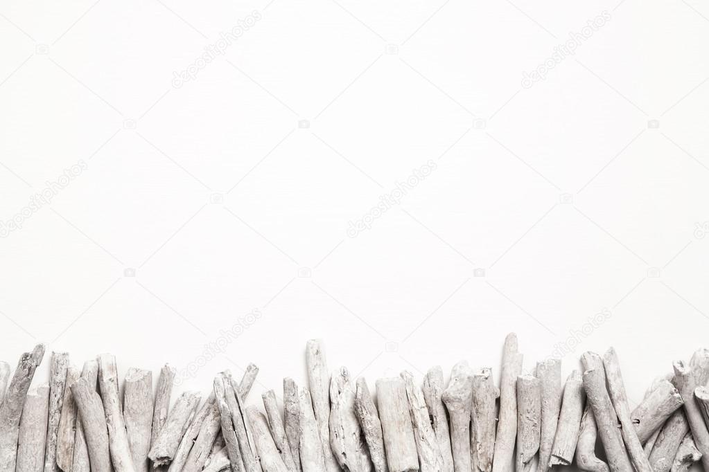 White wooden background in one color with driftwood.