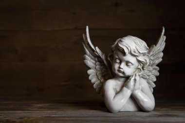 Üzgün melek: bir tebrik veya taziye kartı için fikir.