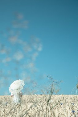 Emotional blue turquoise vintage background with one walking gir