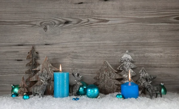 Rustic wooden christmas background with two blue or turquoise ca — Stock Photo, Image