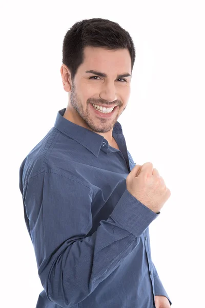 Proud and successful young business man making fist gesture isol — Stockfoto