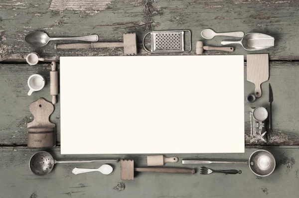 Old white kitchen message sign with cooking utensils for a frame — ストック写真