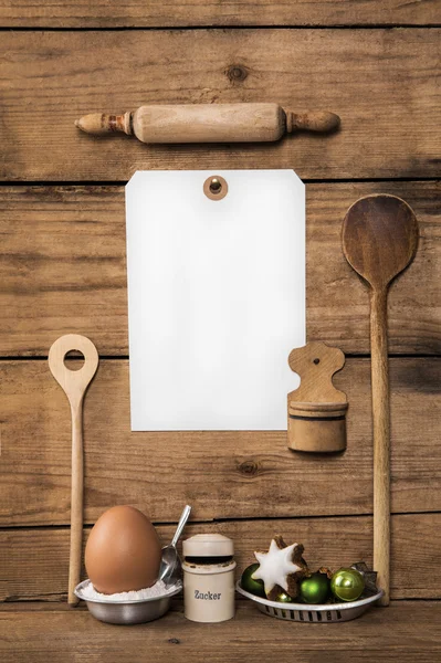 Baking in christmas time. Wooden background with kitchen utensil Royalty Free Φωτογραφίες Αρχείου