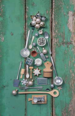 Green christmas decoration. Xmas tree with old wooden and tin mi