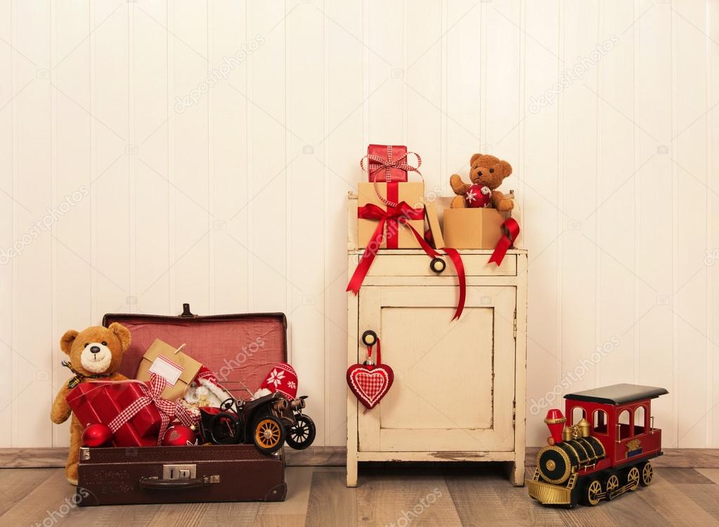 Christmas decoration in antique vintage style with toys on woode