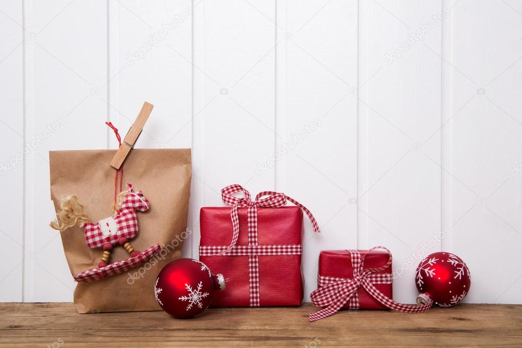 Handmade christmas presents wrapped in paper with red white chec