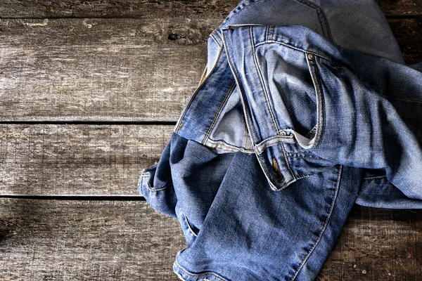 Calça jeans suja no chão — Fotografia de Stock