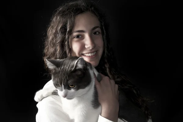 Giovane femmina con gatto Fotografia Stock