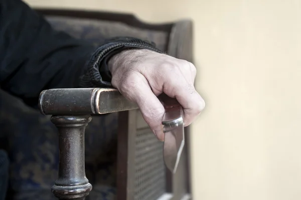 Hand holding knife close up — Stock Photo, Image