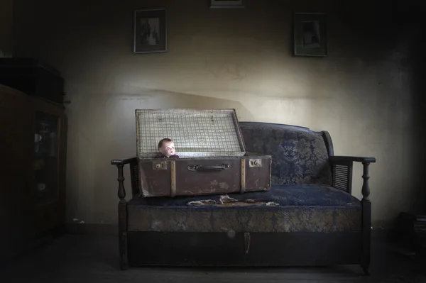 Vintage doll in a suitcase — Stock Photo, Image