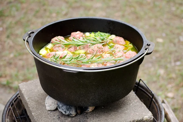 Cast Iron Dutch Oven On Wooden Background With Lid Lifter Stock Photo -  Download Image Now - iStock