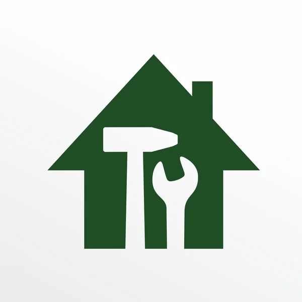 House with hammer and wrench — Stock Photo, Image