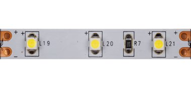 LED strip segment close-up on white background.