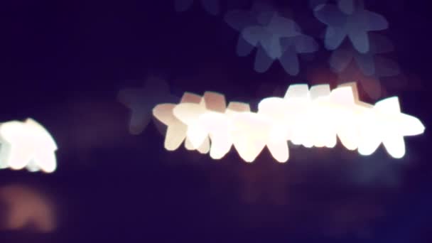 Blur Bokeh Estrelas em um fundo preto — Vídeo de Stock