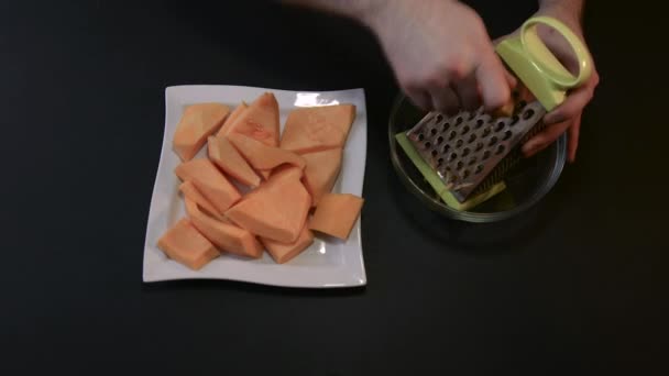 Pieces of Raw Pumpkin Grate — Stock Video