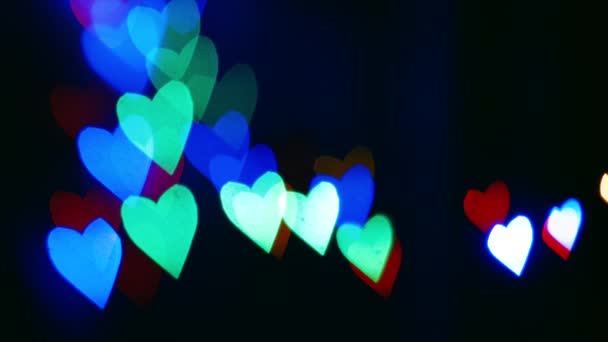 Éléments clignotants de Bokeh coeur lumineux 