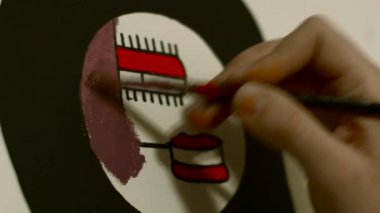 Sanatçı Fütürizm, Pop Art resmi boyar