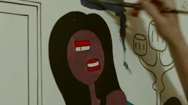 Sanatçı Fütürizm, Pop Art resmi boyar